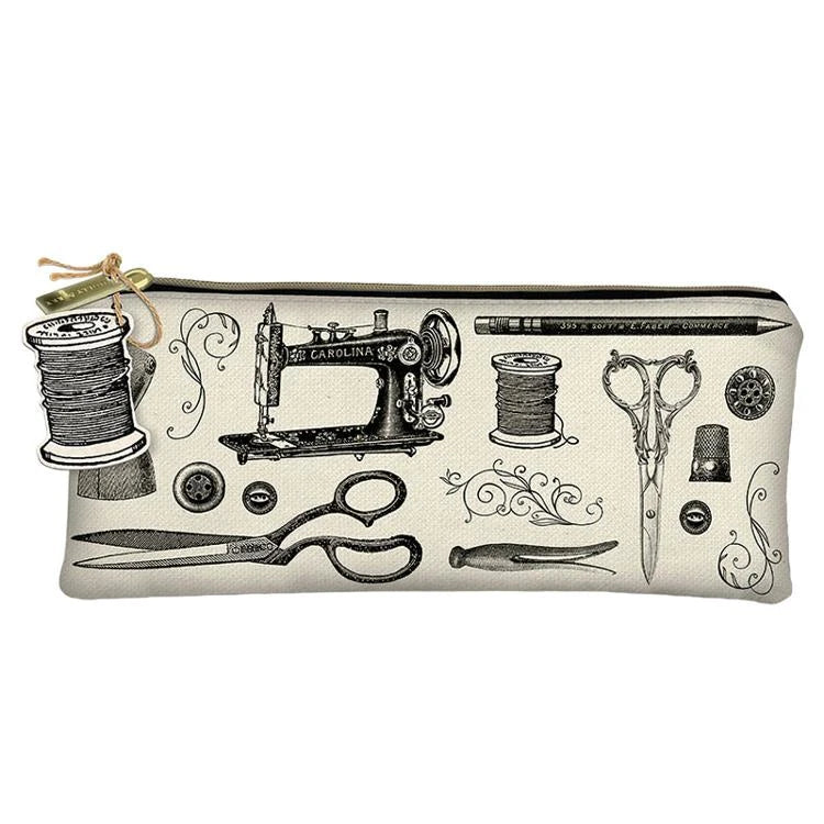 The Life Beautiful Pencil Zipper Bag by United Notions features vintage-style black sewing tool illustrations and a spool-of-thread zipper charm.