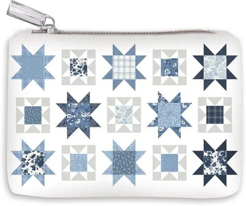 The Sand and Sea Coin Bag is a white zippered makeup bag with sixteen blue and gray quilt star blocks in a grid, each featuring unique fabric designs—ideal for sewing accessories or everyday use.