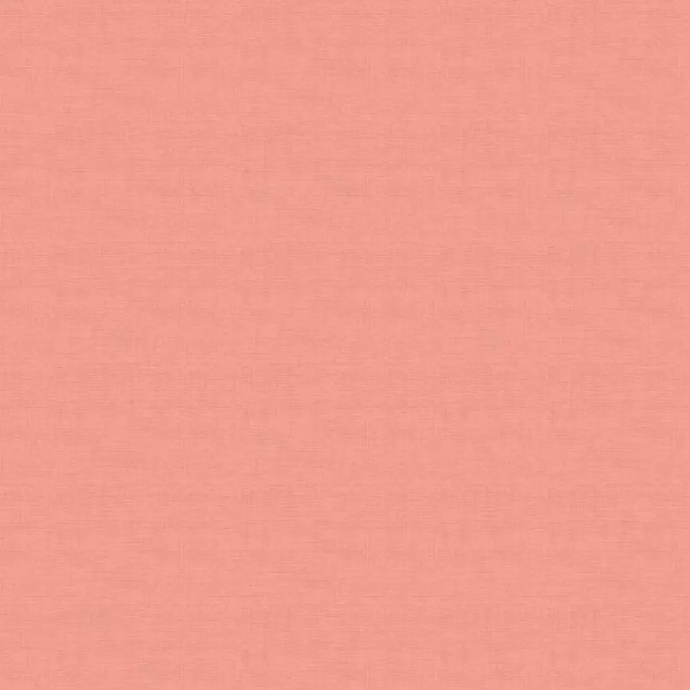 Makower Linen Texture Coral Pink Fabric Yardage features a soft, muted pink color with a subtle linen texture and delicate woven pattern, ideal for projects needing a refined coral pink fabric.