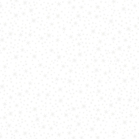 QT Fabrics’ Quilting Illusions White Stars Fabric Yardage features a white background with a delicate pattern of light gray stars and dots, made from 100% cotton—perfect for creating soft, subtle quilting designs.