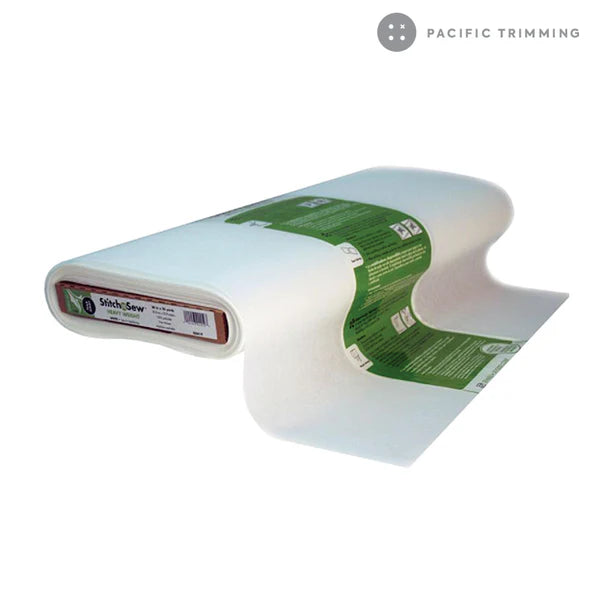 A large bolt of Stitch N' Sew Tear-Away Heavy Weight Stabilizer, 20in wide by Checker Distributor, with a green and white label is shown on a white background. Ideal for use as heavy weight tear-away stabilizer or embroidery backing.