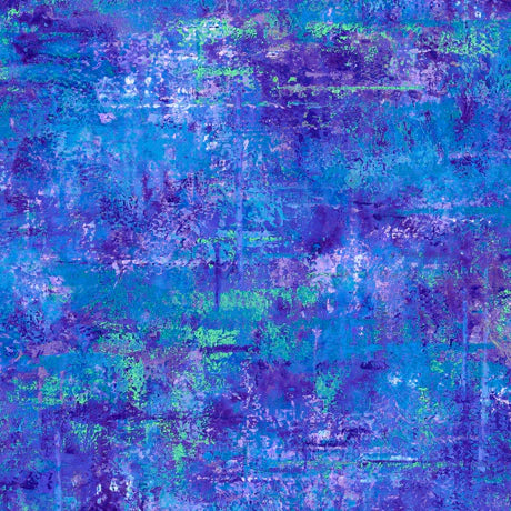 Vibe Royal Mottled Blender Fabric Yardage by QT Fabrics features an abstract, layered pattern in royal blue, purple, and green with brushstroke effects—perfect as a quilting cotton blender.