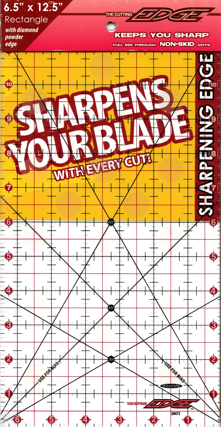The Cutting Edge Clear Sharpening Edge Ruler 6-1/2in x 12-1/2in by Checker Distributor features red and black grid lines, measurement markings, non-skid quilting ruler design, and sharpens your rotary blade with every cut.