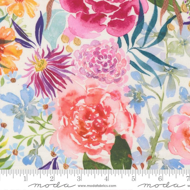 Soulstice Midsummer Bloom Cloud Fabric Yardage by United Notions features pink, purple, orange, and blue flowers with green leaves on white quilting cotton. A ruler displays inches and the United Notions brand name at the bottom.