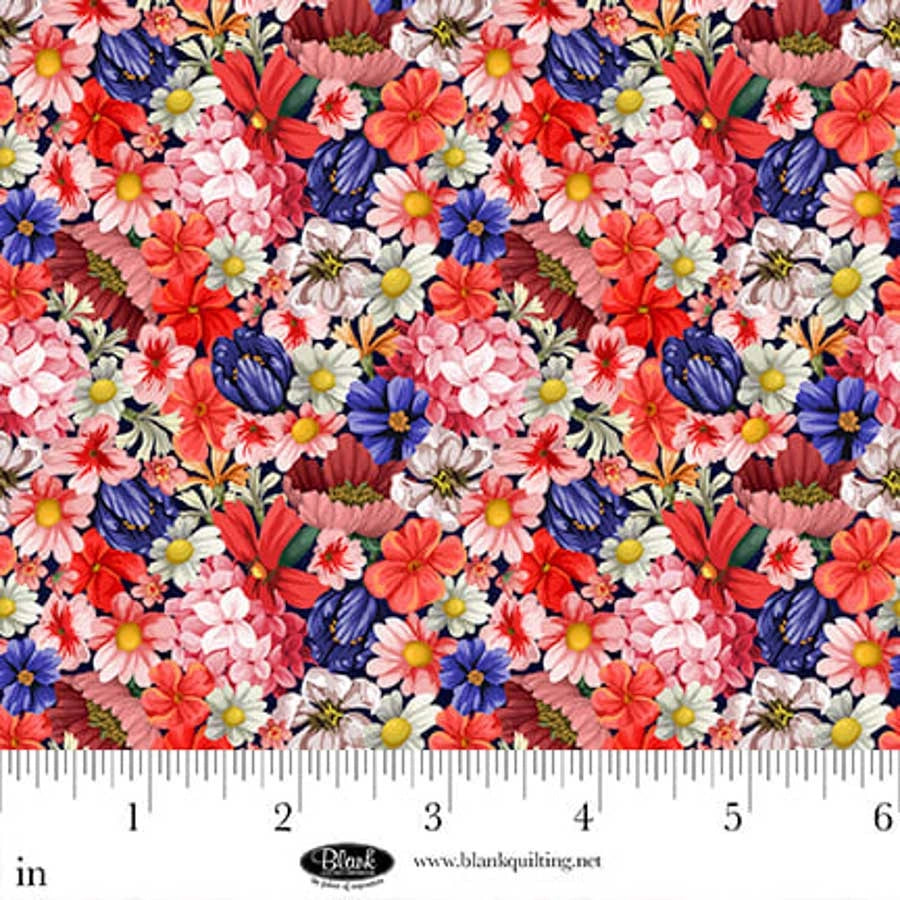 Cameo Appearance Pink Small Floral Fabric Yardage by Jaftex - Blank Quilting features a dense, vibrant floral pattern in pink, red, blue, white, and yellow with green leaves. 100% cotton quilting fabric. Ruler at bottom edge shows inches for scale.