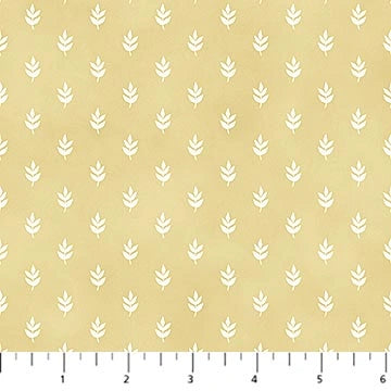 Tiny Waddles Gold Leaf Fabric Yardage by Northcott - Figo features premium light yellow cotton with evenly spaced small white stylized leaf motifs. A ruler in inches is shown at the bottom for scale.