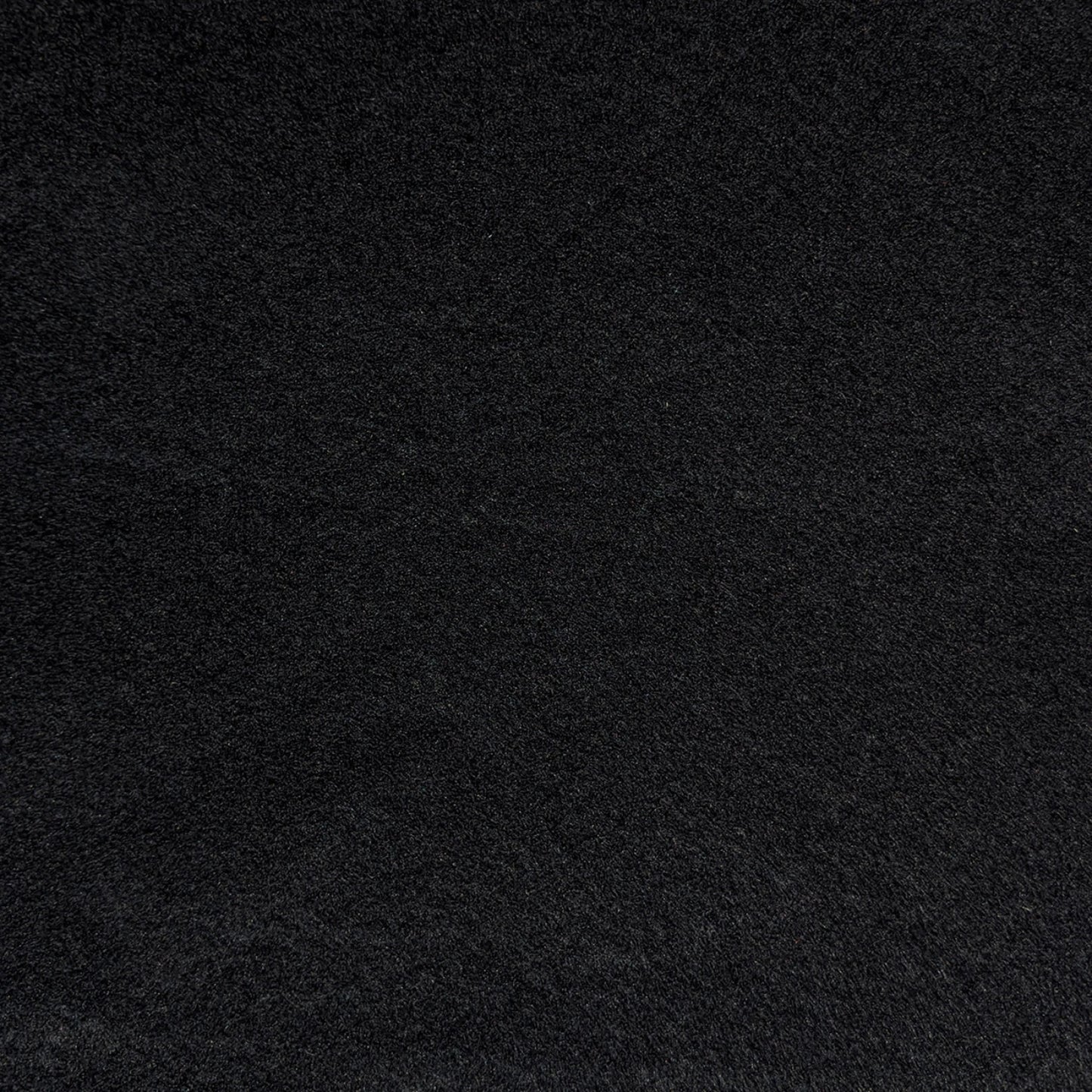 A close-up of 72in Acrylic Black Felt Yardage shows its dark black, soft, slightly uneven texture—perfect as a sewing material for various crafts.