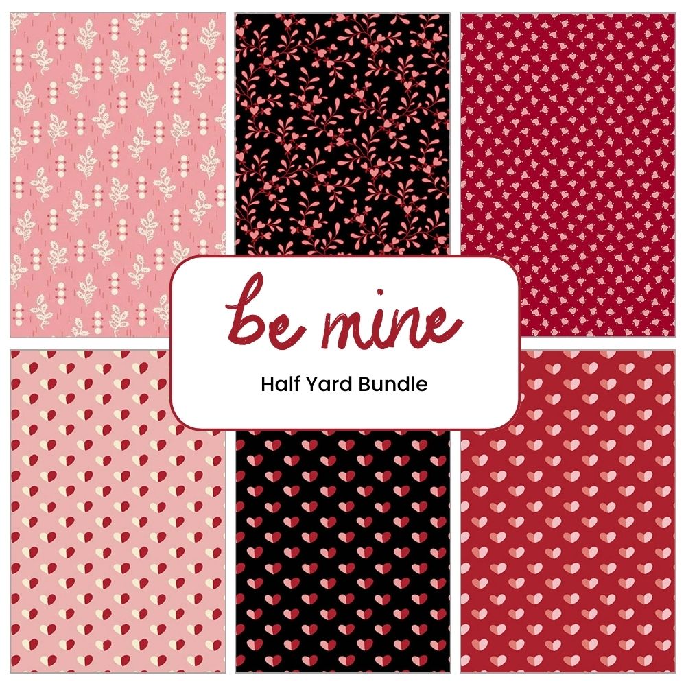 A collage of six heart and floral patterned fabric swatches in red, pink, and black displays a central label reading "Be Mine Half Yard Bundle" by Andover, showcasing this charming half-yard fabric bundle.