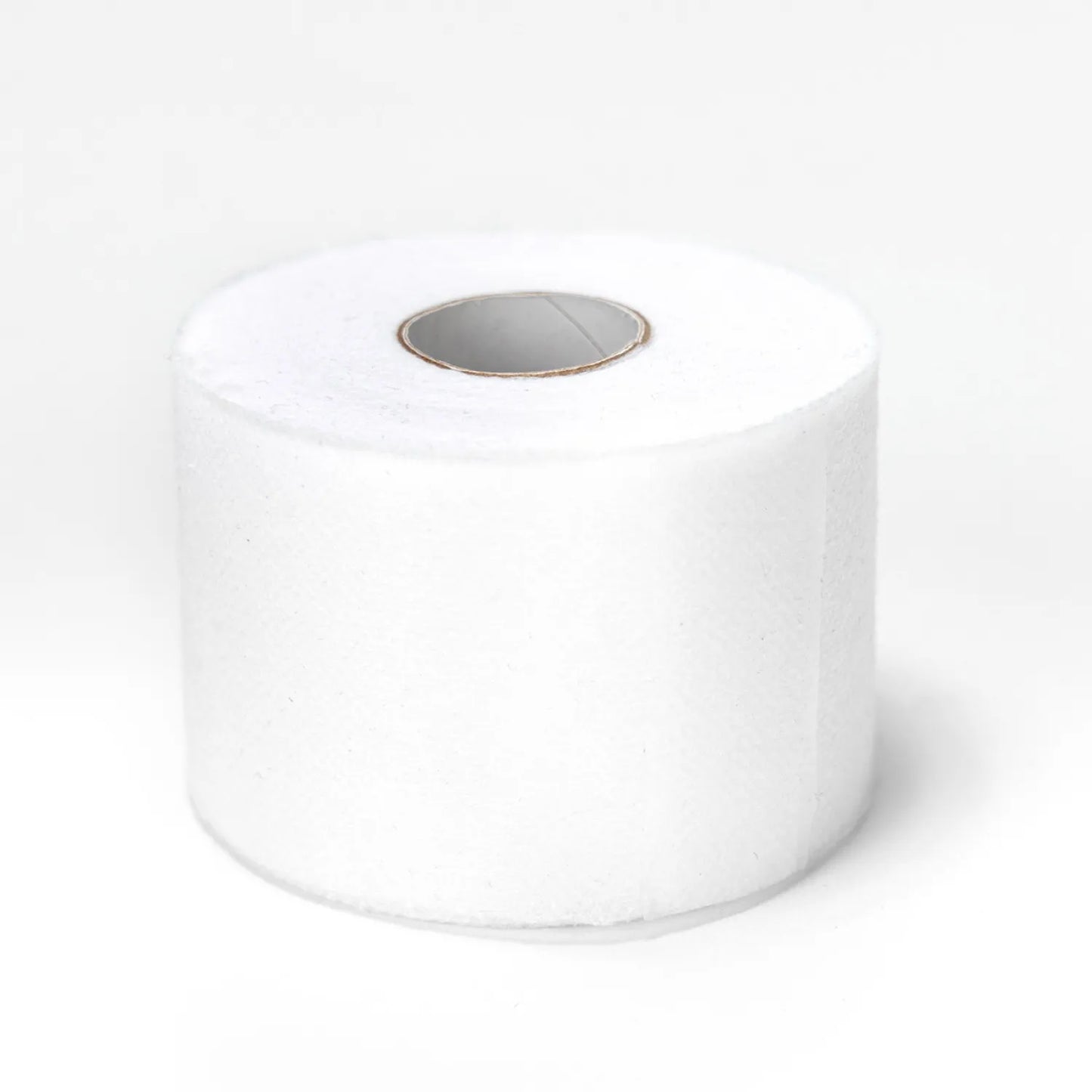 A 2in x 30yds roll of Callie Del Batting Tape on a plain, light background—ideal as fusible stabilizer or for quilting projects.