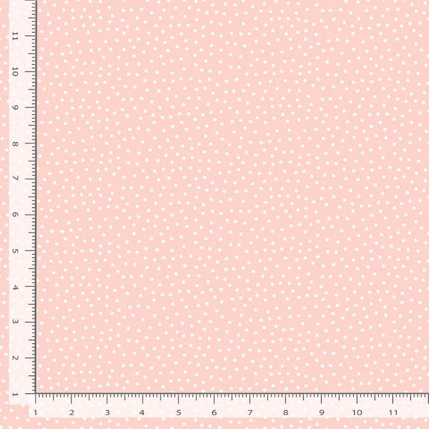 A pale pink 'Til the Cows Come Home Petal Dots Fabric by Timeless Treasures features small white polka dots, black rulers on two edges marked in inches up to 12"—perfect as baby quilt fabric.