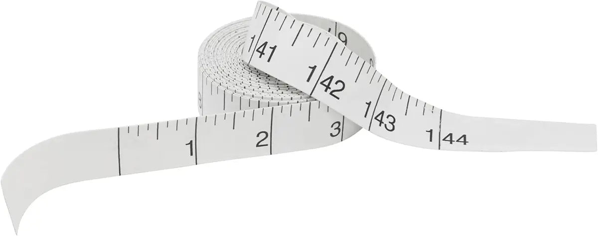 The Zero Centering Measuring Tape is a white tape with large black numbers, partially unrolled and coiled—ideal for longarm quilting or precise centering measurements.