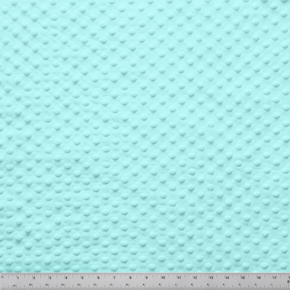 A close-up of Jaftex - Henry Glass Fabrics Minky Dots Aquamarine 60" Wide Quilt Backing Fabric shows its plush dot texture, with a ruler in inches at the bottom for scale.
