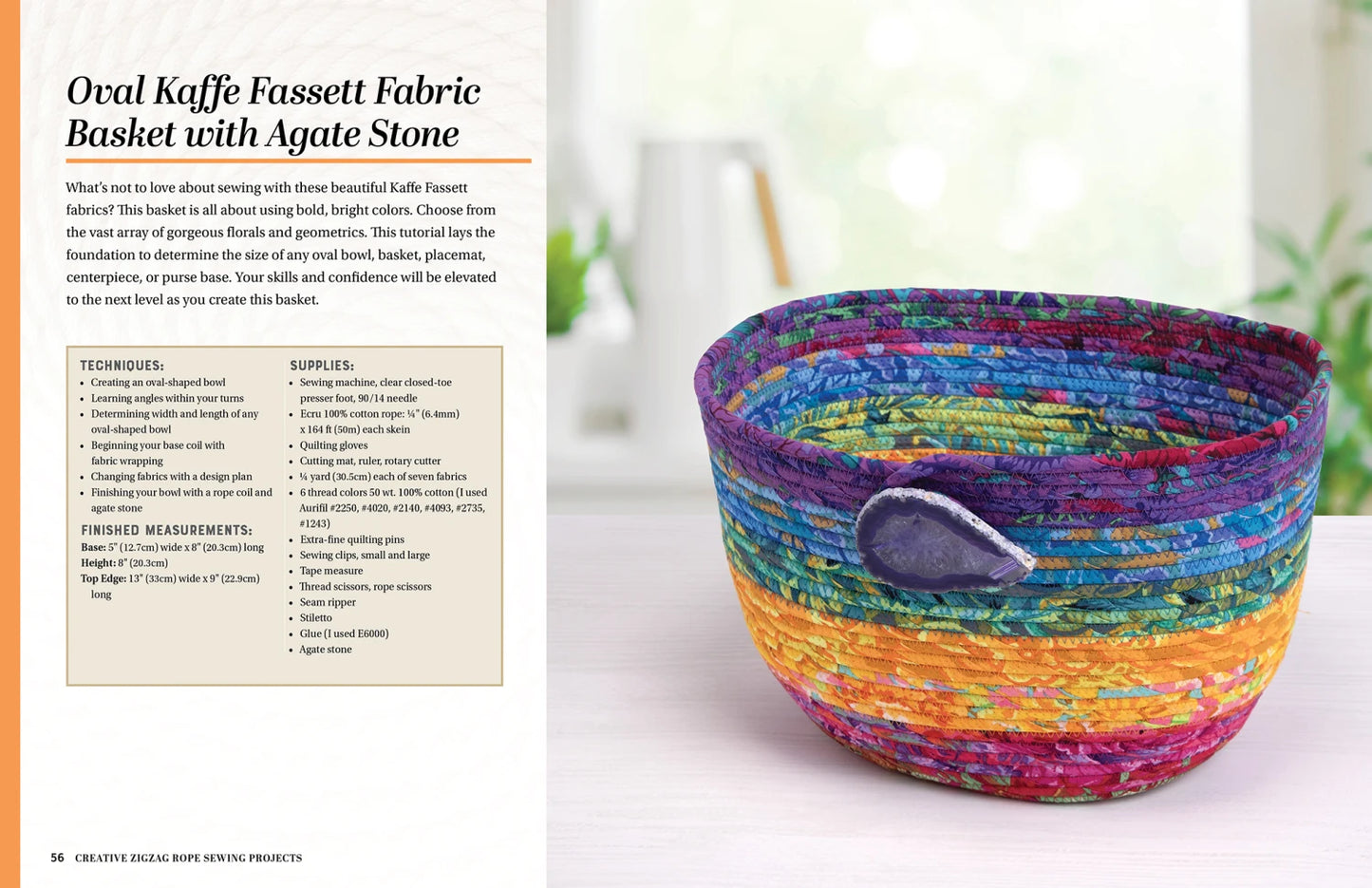 A vibrant, multicolored oval fabric basket—crafted using Checker Distributor’s Creative Zigzag Rope Sewing and embellished with a purple agate stone—rests on a light surface beside instructions and supplies for creative rope projects.