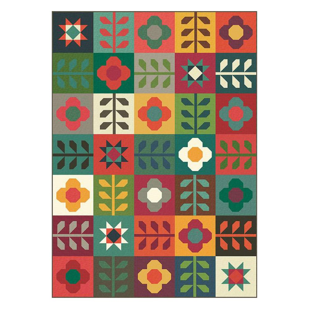 The Mod Blossoms Quilt Kit features a grid pattern with alternating flower, leaf, and star blocks in vibrant shades—crafted using Riley Blake’s Grasscloth Collection fabrics.