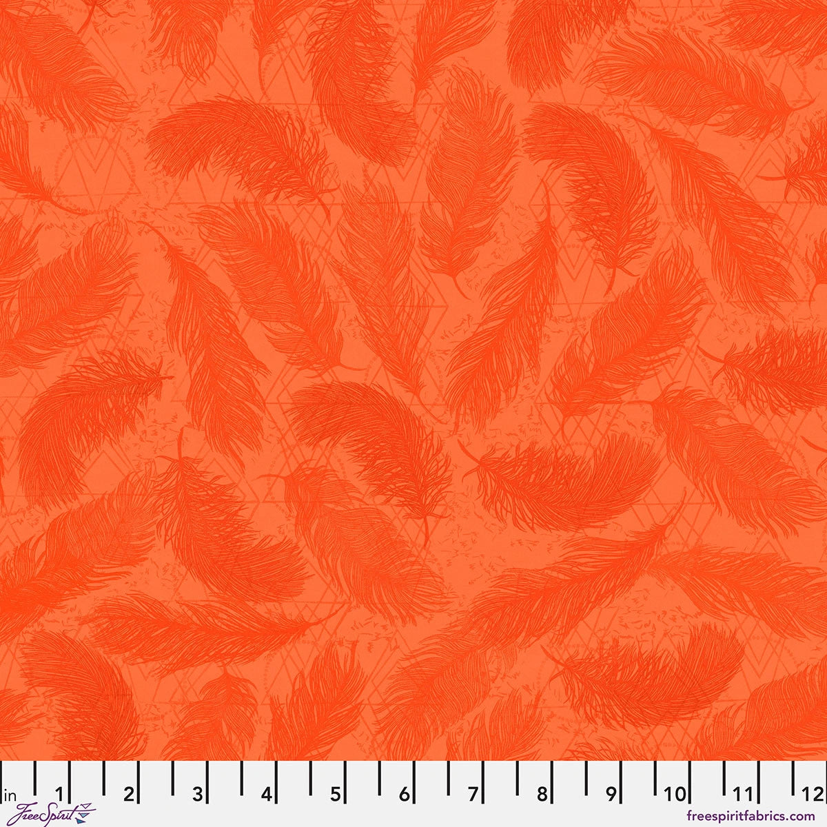 The Wisdom Orange The Whispers Fabric Yardage by Jaftex - FreeSpirit features overlapping feather patterns in dark orange on orange. A ruler shows inches from 0-12. Ideal blender fabric for vibrant projects.