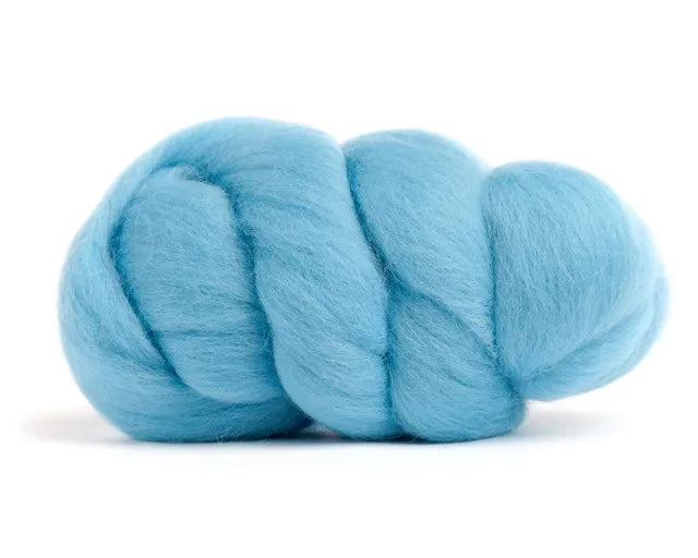 Merino Wool Top Roving Aqua is displayed in soft, thick coils on a white background—ideal for your Merino wool fiber projects.