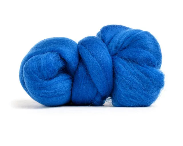 Merino Wool Top Roving Blue—a soft, bright blue bundle of Merino wool roving—is neatly twisted and displayed on a white background.