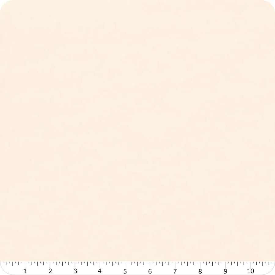 A square swatch of United Notions' Bella Solids Natural Junior Jelly Roll is displayed on a white background, with a ruler marking inches 1–10 along the bottom—perfect for your next sewing project.