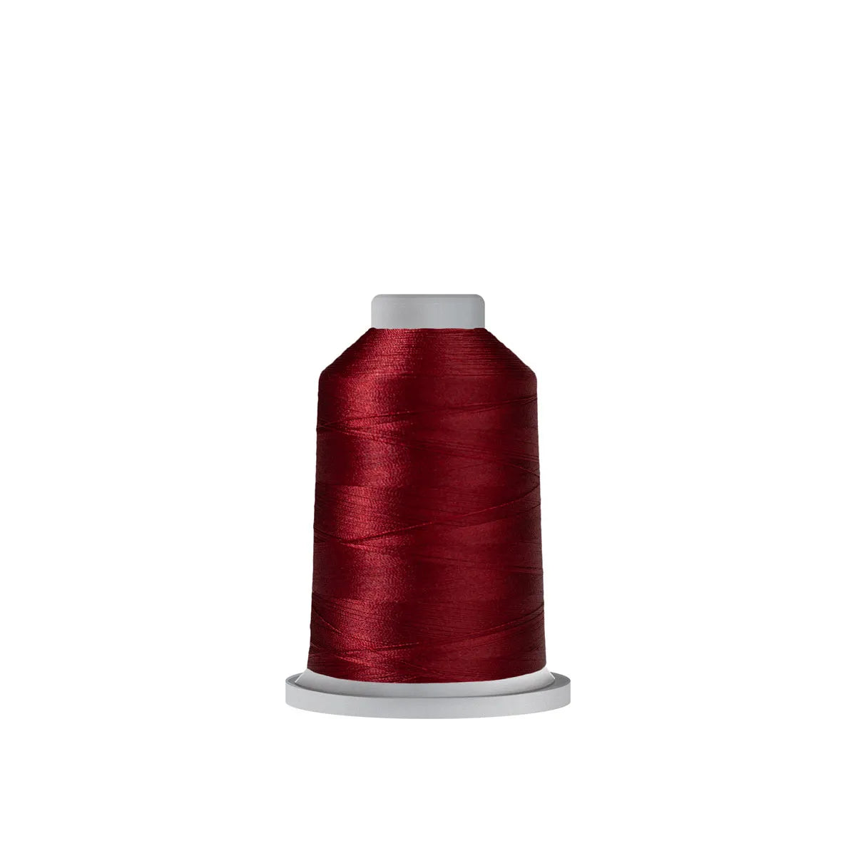 A spool of Glide Thread Soldier Red 70881 by Hab+Dash by Fil Tec stands upright on a white background, its deep red polyester embroidery thread neatly wound around a white plastic core.