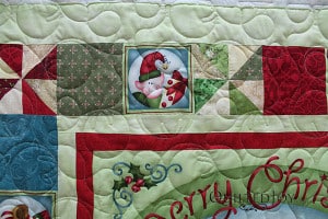 Barbara brought in holiday themed wall hangings for Angela to quilt. With all the holiday fabrics out there, these are a fun way to brighten up your home. QuiltedJoy.com