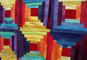 Pat Sturtzel's log cabin quilt with fabrics she dyed herself. Learn to dye your own fabrics at the Dip, Dye, and Dabble Day Camp at Quilted Joy Jan 21-23, 2016