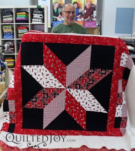 Lemoyne star quilt with U of L novelty fabrics. - QuiltedJoy.com