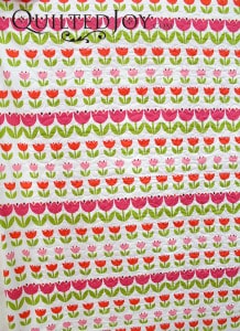 Tulip fabric for the back of a baby quilt - QuiltedJoy.com