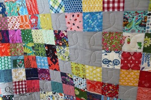 Use your piecing as a guide for your free motion quilting ideas! Dip into alternating rows or columns for an interlocking all over design - QuiltedJoy.com