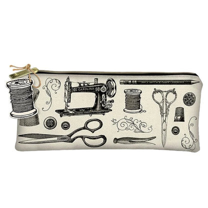 The Life Beautiful Pencil Zipper Bag by United Notions features vintage-style black sewing tool illustrations and a spool-of-thread zipper charm.