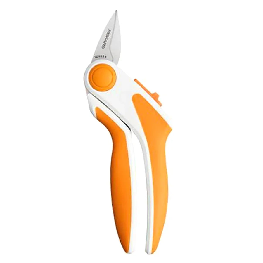 The Fiskars Easy Action Rag Quilt Snip for Tabletop Cutting Gen 2 by Checker Distributor features orange and white handles and stainless steel blades, ergonomically inspired for comfortable gardening and quilting tasks.