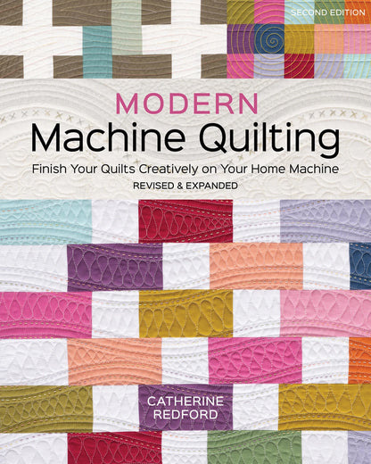 Cover of Modern Machine Quilting Second Edition by Checker Distributor, featuring colorful quilt patterns. Highlights walking-foot and free-motion quilting. Subtitle: Finish Your Quilts Creatively on Your Home Machine. Revised & Expanded.