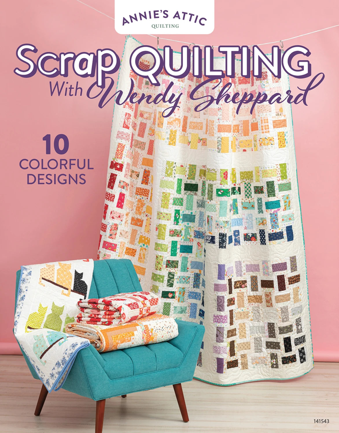 A vibrant patchwork quilt hangs beside a teal chair topped with folded quilts. Text: Scrap Quilting With Wendy Sheppard from Checker Distributor—10 colorful designs featured in this quilting book.