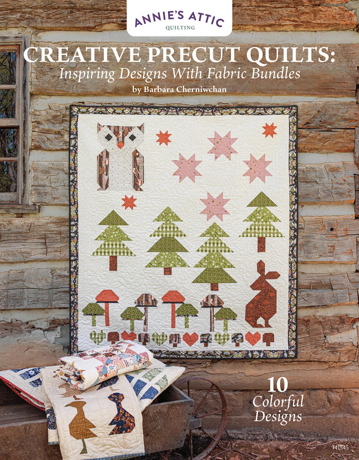The book cover for Creative Precut Quilts: Inspiring Designs With Fabric Bundles by Checker Distributor features a woodland-themed quilt with trees, animals, and mushrooms displayed against a rustic log cabin wall.