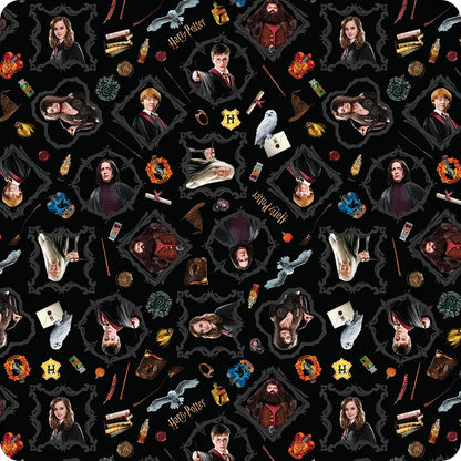 Benartex's Harry Potter Black Magic 108" Wide 3 Yard Quilt Fabric Back Pack showcases iconic characters, magical creatures, wands, and symbols on a black background—ideal for creating stunning Harry Potter-themed quilts or decor.