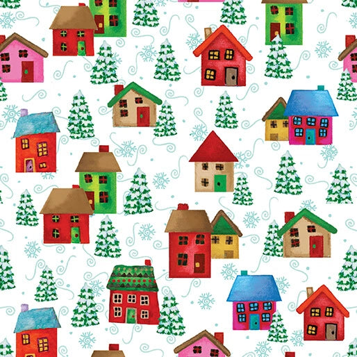 Snow Joy White Village Fabric Yardage by Benartex features a seamless pattern of colorful houses, green pine trees, blue swirls, and snowflakes—ideal for holiday décor or cheerful quilting projects.
