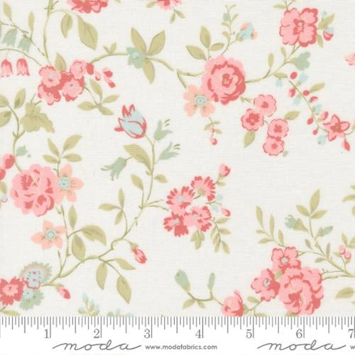 Abide Linen White Main Fabric Yardage by United Notions is a cream-colored floral quilting cotton with delicate pink, red, blue, and green flowers and leaves. A ruler at the bottom shows inch scale and moda branding.