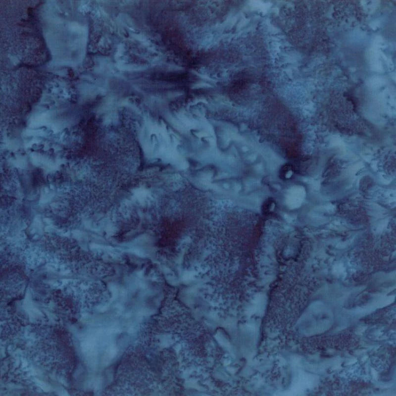 1895 Watercolors Navy Batik Fabric Yardage by Hoffman Fabrics features a swirling, marbled abstract pattern in deep blue and indigo tones, ideal for quilting projects.