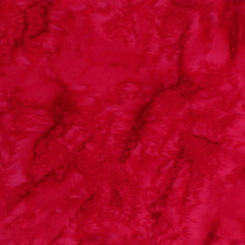 1895 Watercolors Red Batik Fabric Yardage by Hoffman Fabrics features a textured, marbled red abstract design with varying shades, reminiscent of quilting cotton and creating a soft, cloudy effect.