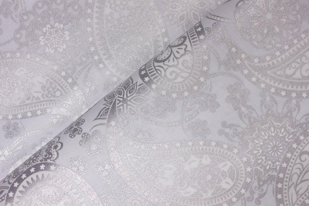 Close-up of Paisley with Silver Metallic Accents on Light Gray, displaying intricate floral and geometric designs. The softly folded fabric highlights the detailed metallic print and elegant shimmer.