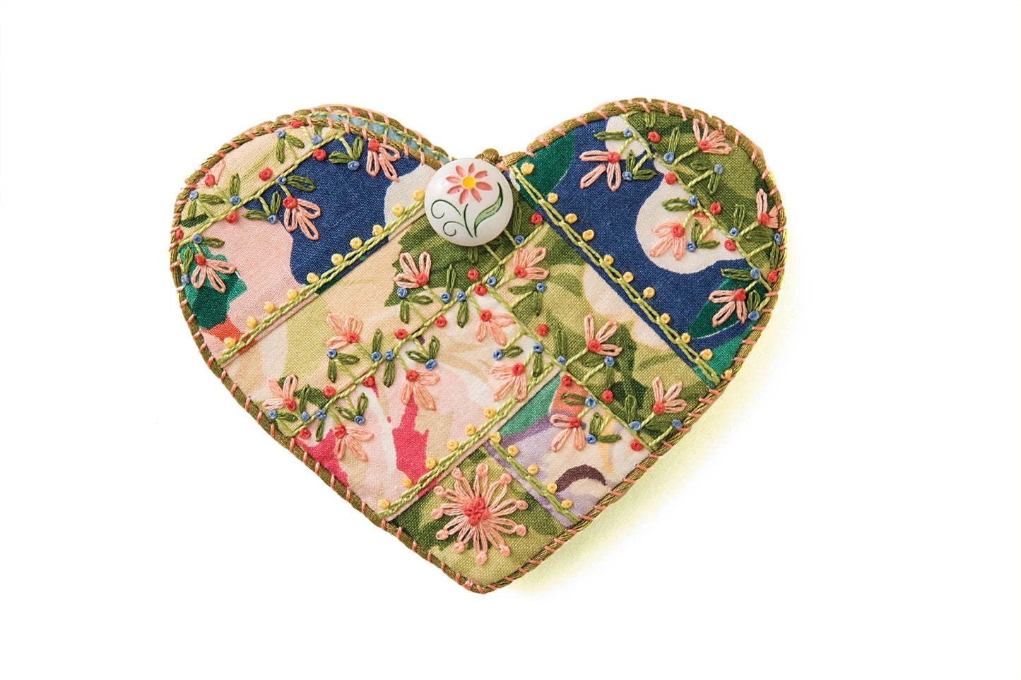 The Embroidery Stitching Handy Pocket Guide by Checker Distributor includes tips for creating colorful patchwork designs, embroidered flowers and leaves, and decorative button accents like pink flower motifs.