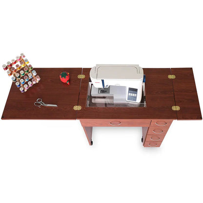 A top-down view of the Alice Sewing Cabinet (available in 2 colors) with an extended surface, sewing machine, colorful thread rack, red pincushion, scissors, and right-side drawers—ideal mid-size furniture for any craft room.