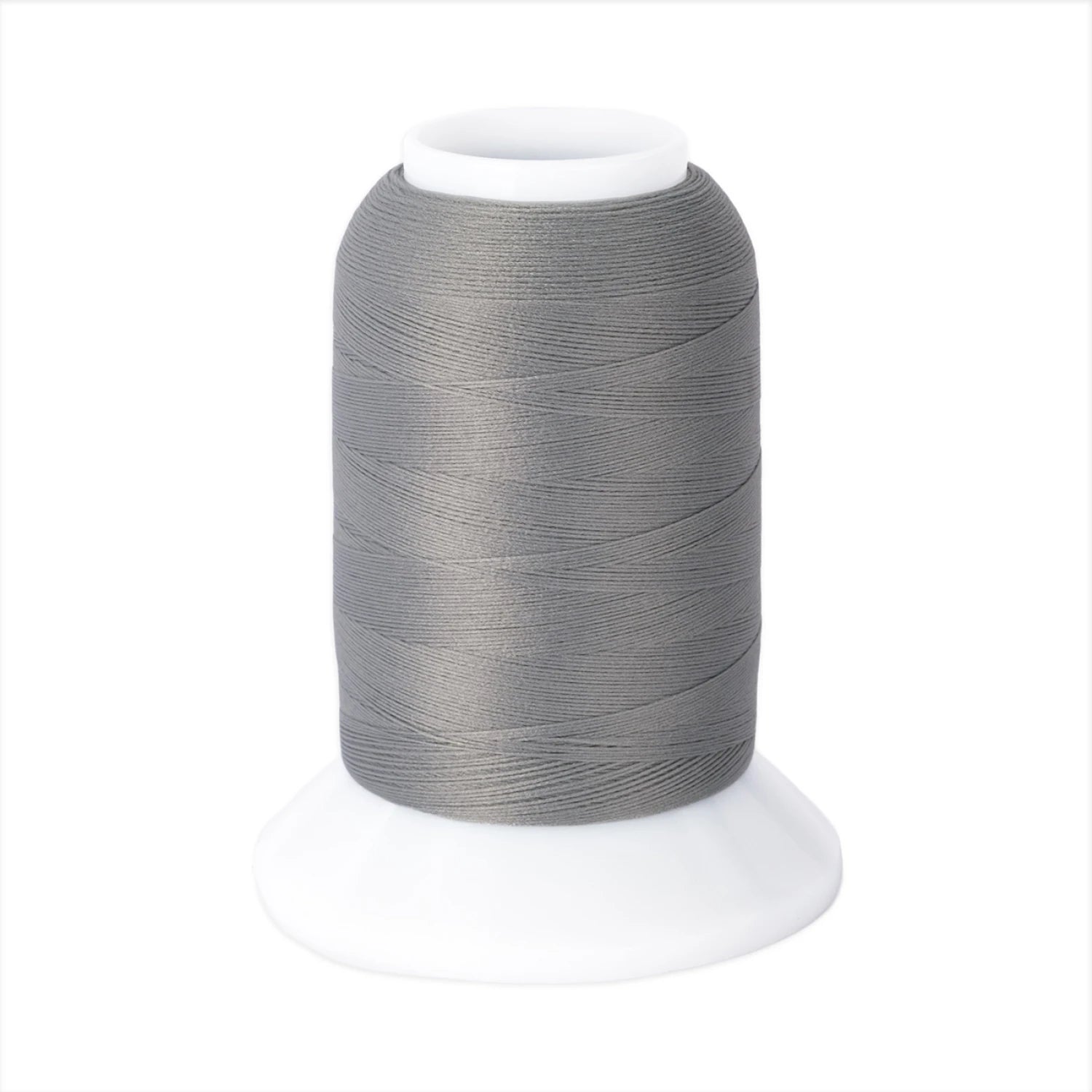 The Woolly Nylon #111 Grey 1000m thread by Checker Distributor sits on a white plastic base against a plain background, ideal for serging stretch knit fabrics.
