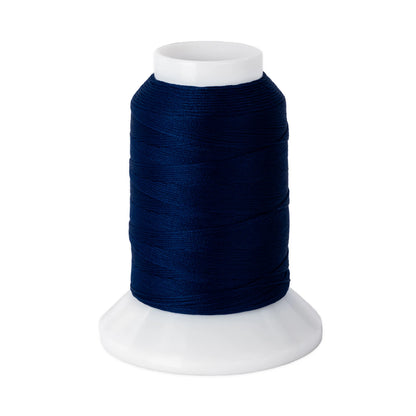 The Brewer Sewing Woolly Nylon #139 Navy 1000m serger thread is neatly wound on a white plastic cone-shaped base, displayed against a plain white background.