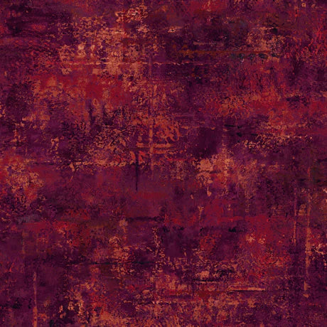 Vibe Wine Mottled Blender Fabric Yardage by QT Fabrics features a distressed, painterly design with deep burgundy, red, orange, and brown tones. Its mottled texture creates a rich, earthy look perfect for premium quilting projects.