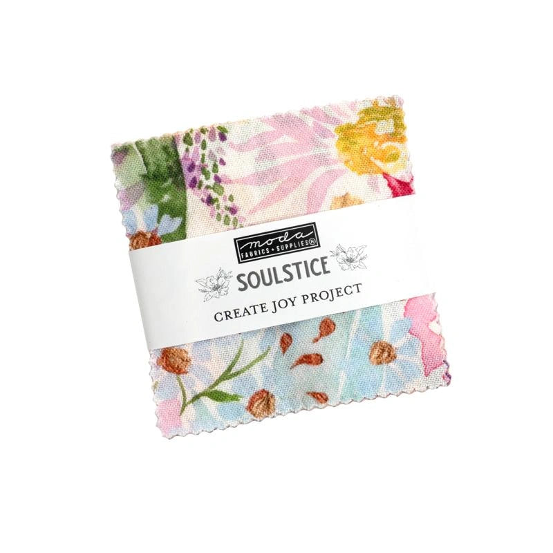 A small fabric square with colorful floral patterns, wrapped in a white label reading United Notions, Soulstice Mini Charms.