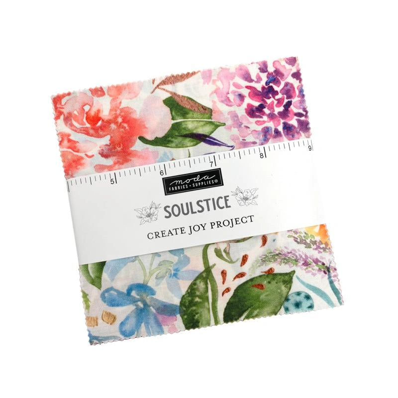 The Soulstice Charm Packs by United Notions are precut square fabric bundles featuring colorful floral and leaf designs, wrapped in a white paper band—perfect for quilting projects.