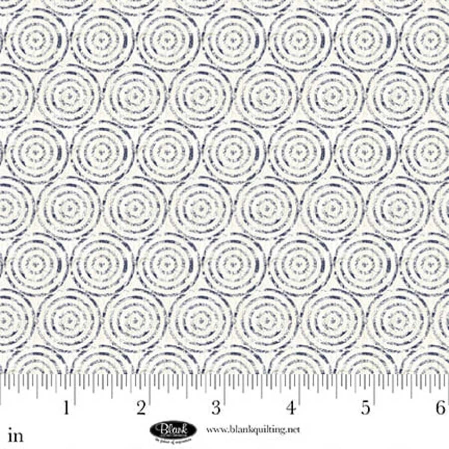 Cameo Appearance White Circular Geometric Fabric Yardage by Jaftex - Blank Quilting features blue concentric stitched circles on white, ideal for modern patchwork. An inch ruler at the bottom provides scale.