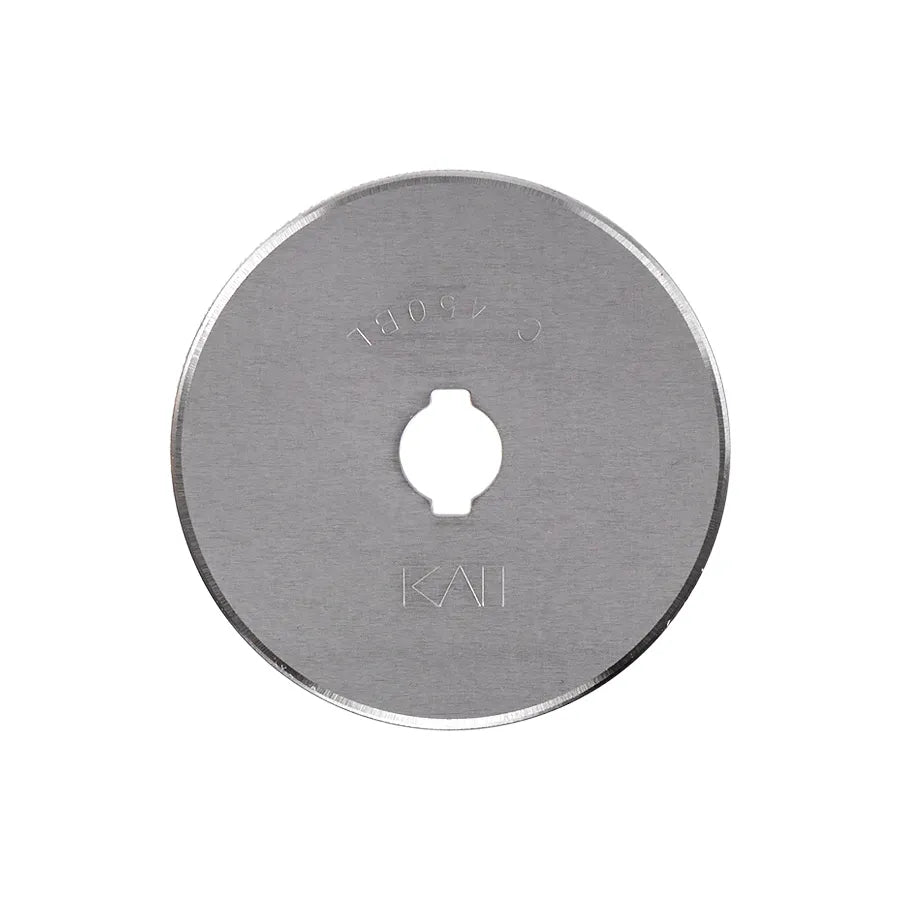 The KAI 45mm Rotary Blade by Checker Distributor is a round, stainless steel blade with a central mounting hole and engraved markings—ideal as a replacement blade for your rotary cutter, shown on a white background.