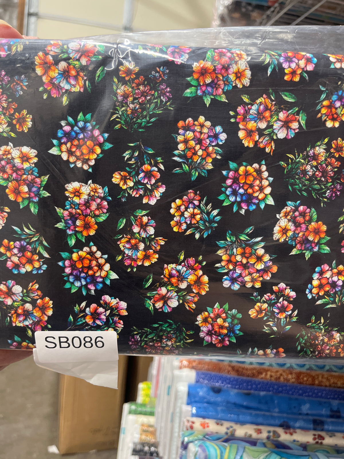 Flight of the Hummingbird Black floral quilting fabric short bolt