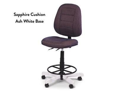 The Koala SewComfort Chair has a tall, ergonomic design with a sapphire cushion, black adjustable frame, foot ring, and an ash white base on five casters. Text on the left reads: Sapphire Cushion Ash White Base.